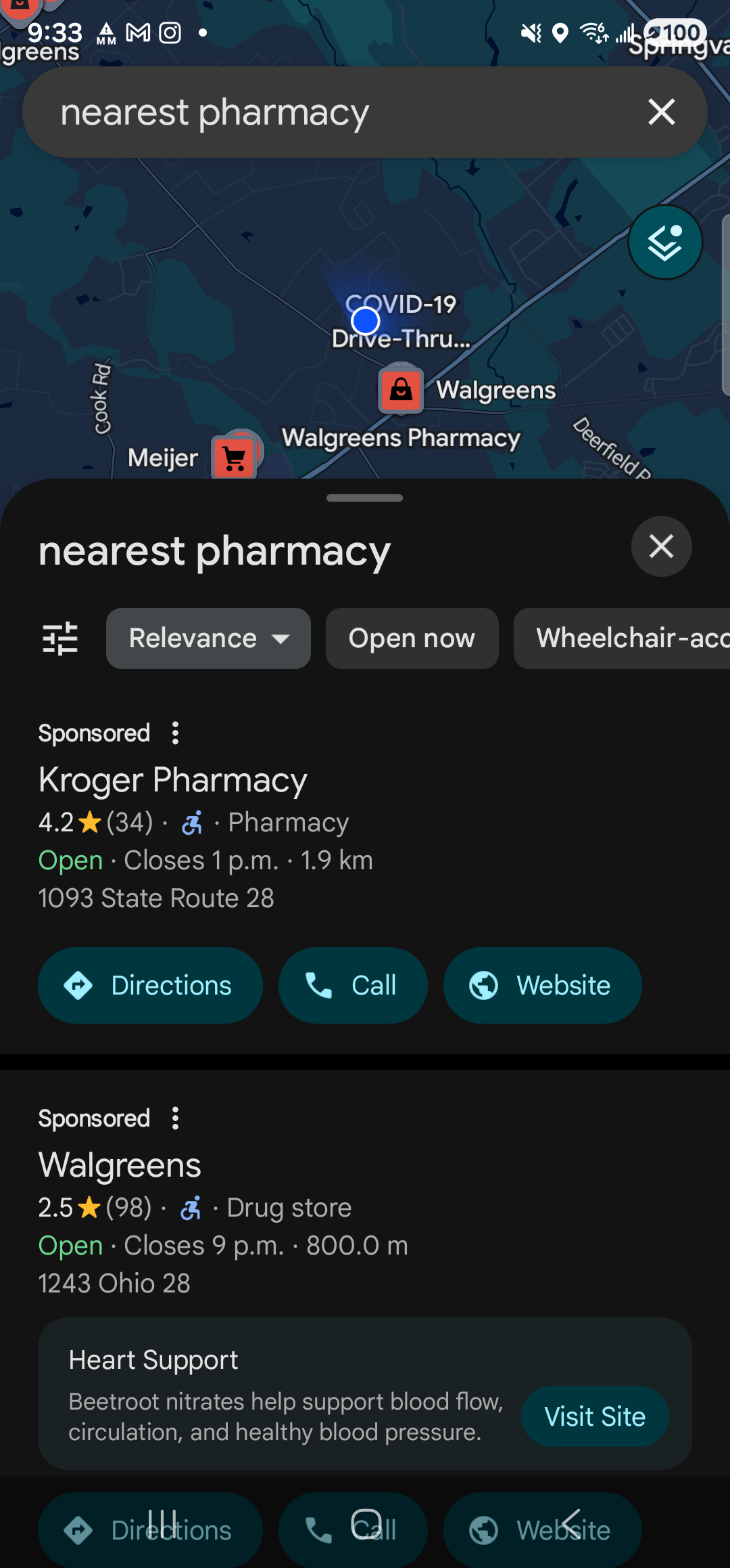 Google Maps full-screen on the Samsung Galaxy S23 Ultra in dark mode. The search bar at the top reads ‘nearest pharmacy’. The map below shows nearby pharmacy pins (Walgreens, Walgreens Pharmacy, Meijer, COVID-19 Drive-Thru) plotted along the surrounding streets. A bottom results sheet titled ‘nearest pharmacy’ lists ‘Kroger Pharmacy’ first — 4.2 stars, Open, Closes 1 p.m., 1.9 km, with ‘Directions’, ‘Call’ and ‘Website’ buttons — followed by a ‘Walgreens’ entry below.