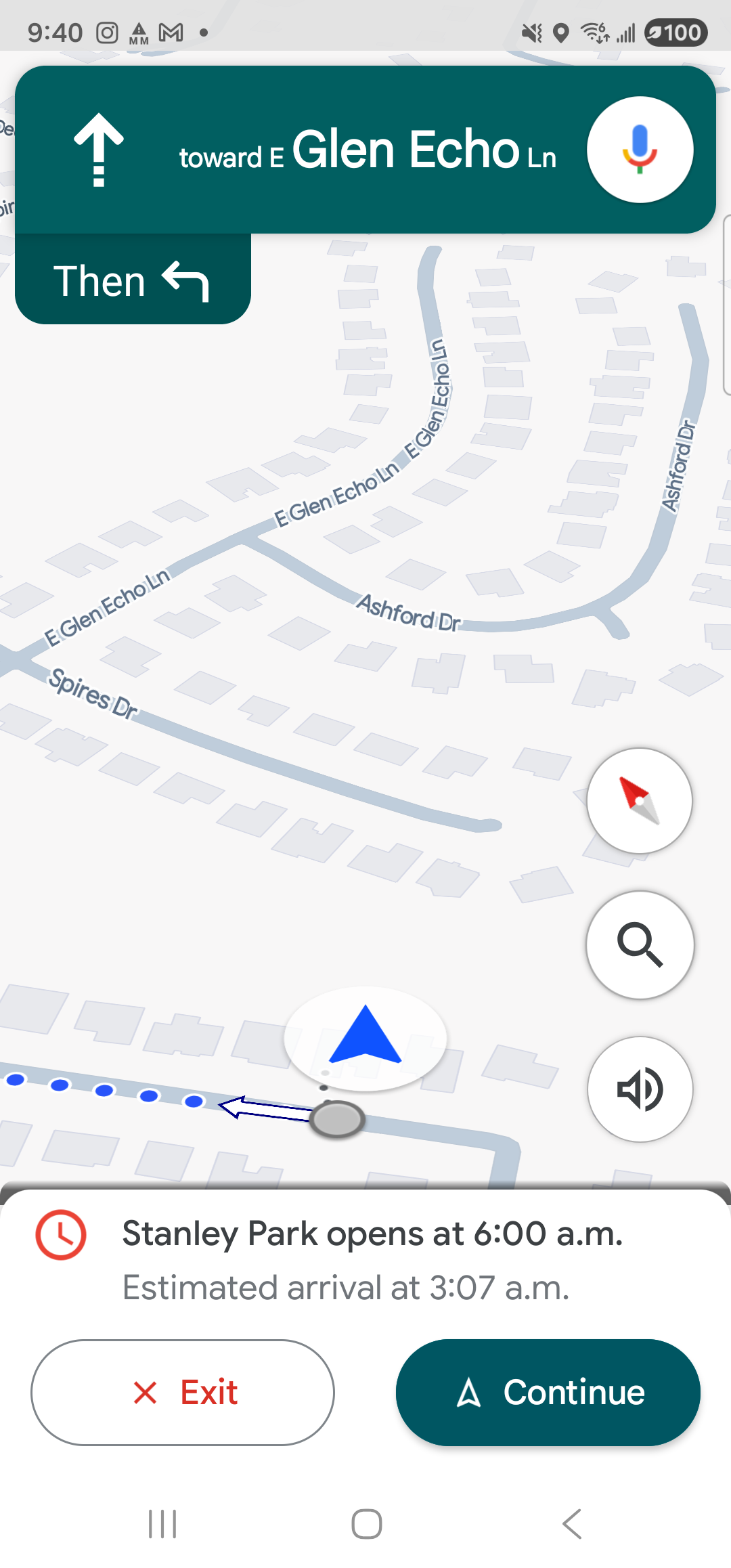 Google Maps full-screen turn-by-turn walking navigation on the Samsung Galaxy S23 Ultra. A green banner at the top shows the first walking instruction ‘↑ toward E Glen Echo Ln’ with a microphone control on the right. Beneath it a smaller chip reads ‘Then ↰’. The map fills most of the screen with the user’s blue location arrow, a dotted blue walking-route line heading off-screen, and surrounding street labels (E Glen Echo Ln, Ashford Dr, Spires Dr). A bottom card warns ‘Stanley Park opens at 6:00 a.m.’ with the estimated arrival time, alongside a white ‘× Exit’ button and a green ‘△ Continue’ button.