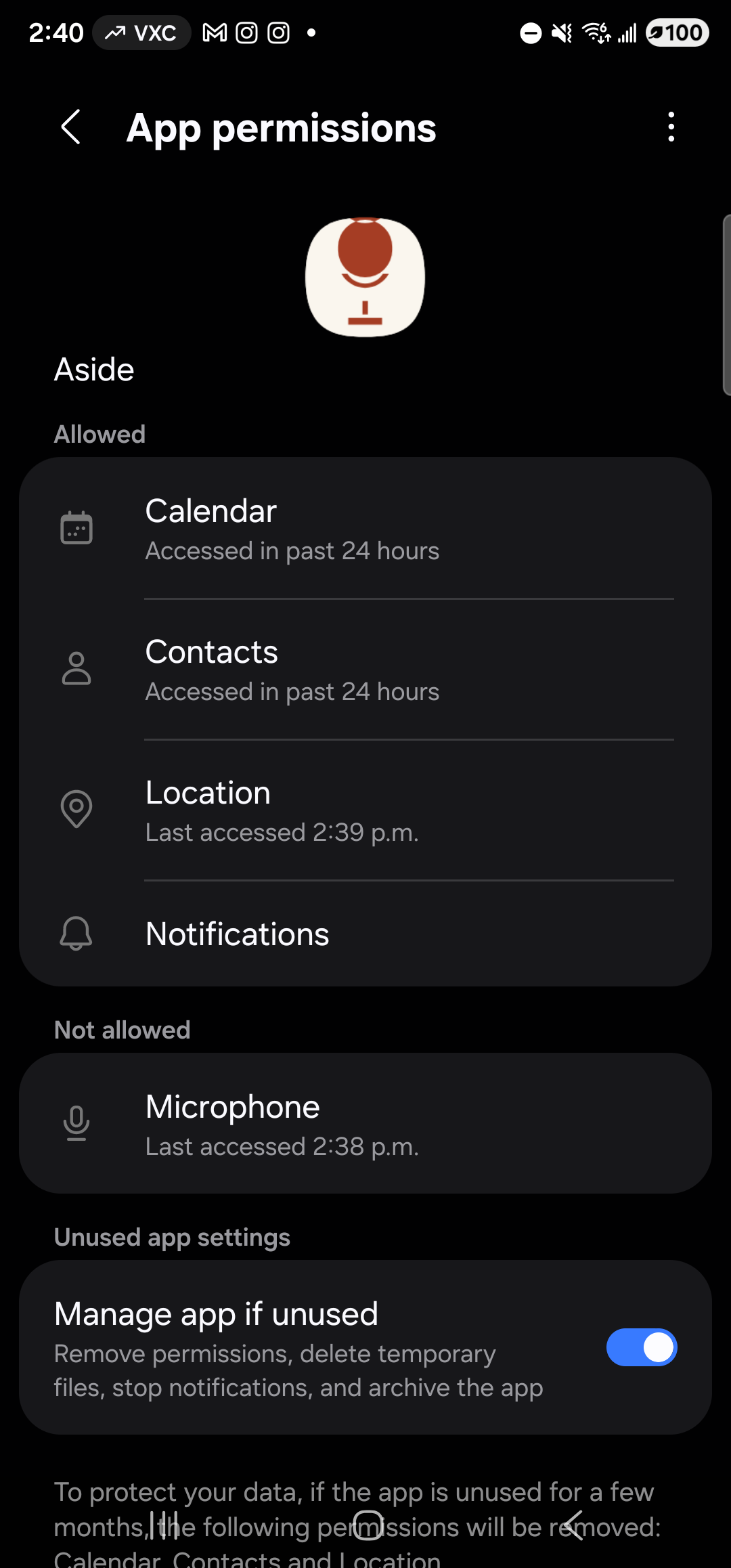 The Samsung One UI App permissions screen for Aside, in dark mode. Header reads ‘App permissions’ with a back arrow on the left and a kebab menu on the right. Centered near the top: the warm-paper Aside icon (clay mic glyph) and the app name ‘Aside’. Below that, the section eyebrow ‘Allowed’ over a rounded card listing four rows, each with a small icon and a relative-time subtitle: ‘Calendar — Accessed in past 24 hours’, divider, ‘Contacts — Accessed in past 24 hours’, divider, ‘Location — Last accessed 2:39 p.m.’, divider, ‘Notifications’ (no subtitle). Below that, the section eyebrow ‘Not allowed’ over a card with a single row, highlighted as the next tap target: ‘Microphone — Last accessed 2:38 p.m.’ Below that, the section ‘Unused app settings’ with a row ‘Manage app if unused’, subtitle ‘Remove permissions, delete temporary files, stop notifications, and archive the app’, and a blue ON toggle. Below it the start of a small gray paragraph beginning ‘To protect your data, if the app is unused for a few months the following permissions will be re…’ (truncated at the screen edge).