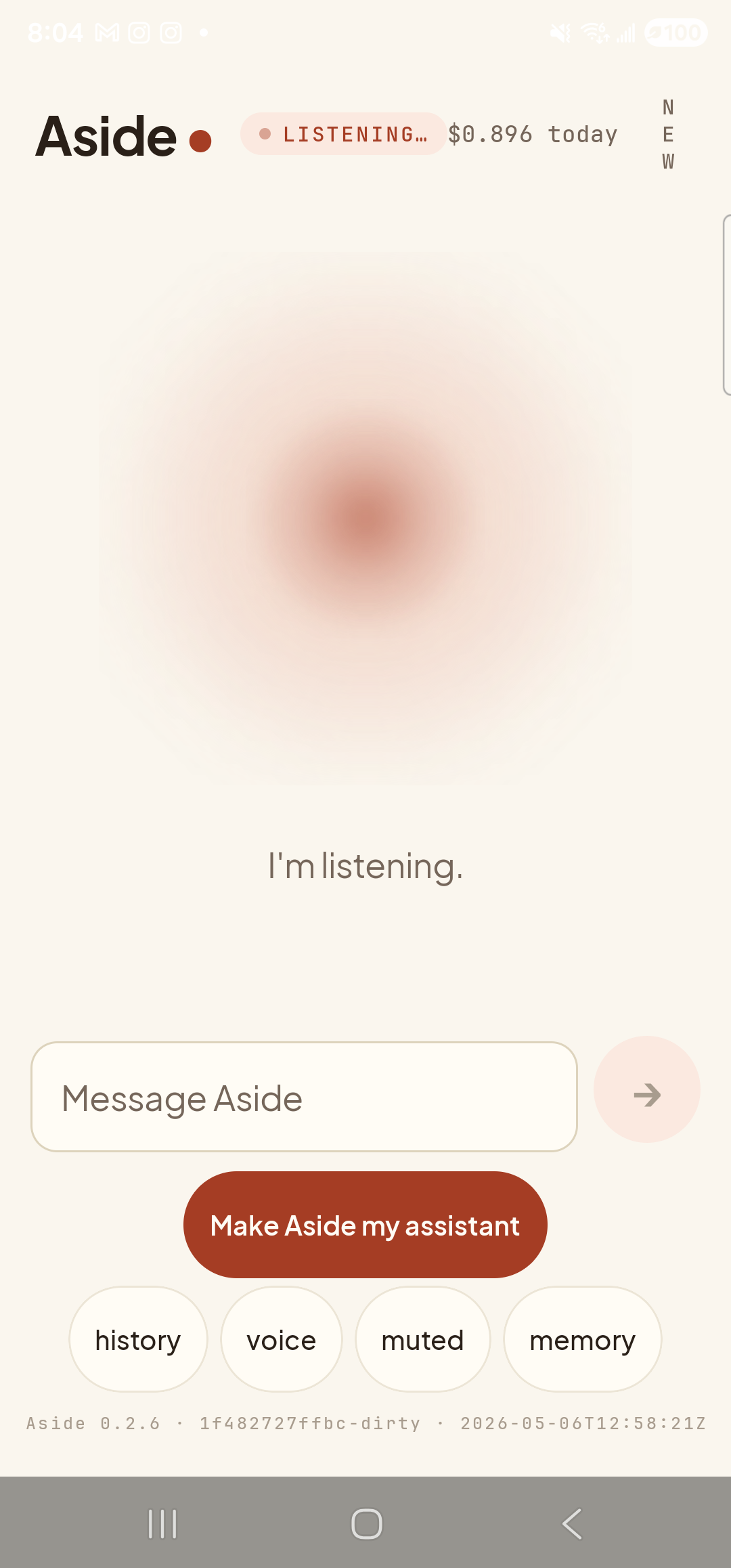 The Aside main screen, back in the listening state for the second time. The status pill at the top reads ‘● LISTENING…’ again, with the cost counter now showing ‘$0.896 today’ (climbed from $0.859 in step 1, reflecting the just-finished first turn). The orb has returned to its softer listening visual style. Beneath the orb, the line ‘I’m listening.’ has reappeared. The ‘Message Aside’ text input is still visible below the caption (text-mode composer carried over from the previous turn). The bottom pill row reads ‘history · voice · muted · memory’.